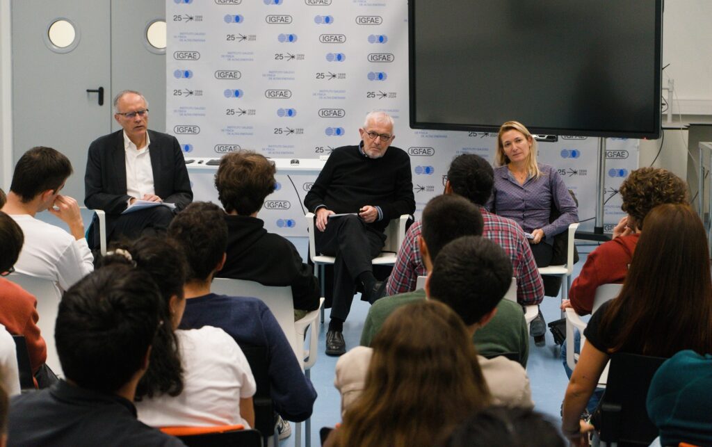 Paolo Giubellino, Francis Halzen and Giulia Zanderighi, at the meeting with PhD students and postdoctoral research staff. Credit: IGFAE.